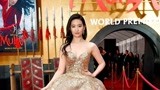 刘亦菲现身《花木兰》首映红毯 穿金礼服美艳动人