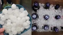 广西柳州突降冰雹 市民用容器盛起冰镇啤酒饮料,还要下锅煮＂汤圆＂