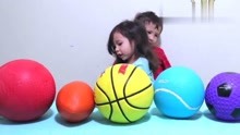 为托德人和儿童学习颜色和不同运动球名称与彩色篮球